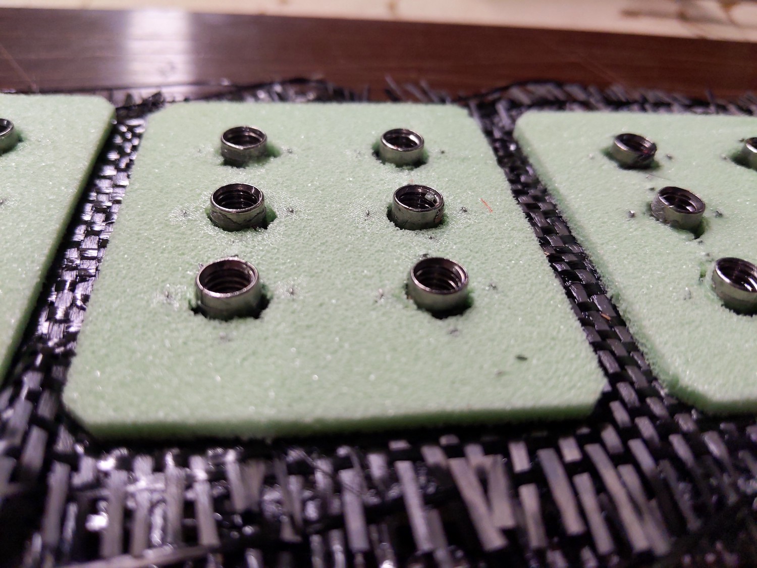 Stainless steel inserts after curing 2/2